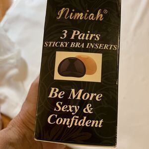 Silicone Bra Inserts: two nude/one black.  Work best with A&B Cups